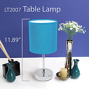 A lovely, inexpensive, and practical table lamp to meet your basic fashion lighting needs. This mini lamp features a chrome base and fabric shade. Perfect for living room, bedroom, office, kids room, or college dorm!Fabric shade | Mini chrome base | Perfect for living room, bedroom, office, kids room, or college dorm | Height: 11" shade diameter: 5.51"
