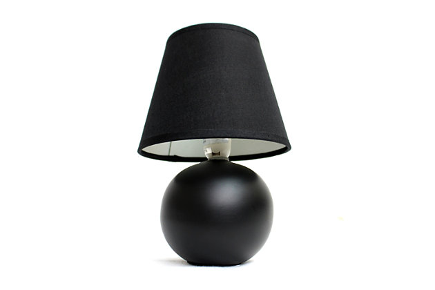 A lovely, inexpensive, and practical table lamp to meet your basic fashion lighting needs. This mini globe lamp features a ceramic base and matching fabric shade. Perfect for living room, bedroom, office, kids room, or college dorm!Mini globe shaped ceramic base | Matching fabric shade | Perfect for living room, bedroom, office, kids room, or college dorm | Height: 8.66" shade diameter: 5.51"