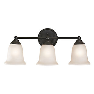 If you’re looking for a simply elegant choice, the Sudbury 3-light bath vanity fixture is sure to ring your bell. Trio of bell-shaped shades crafted of white glass are pure delight. Dark bronze-tone metal and rounded back plate beautifully pop.Made of metal in oil rubbed bronze-tone finish | White glass shades | 3 E26 bulbs (not included); 75-watt max | Uplit or downlit positioning | Indoor use only | Hardwired; professional installation recommended | Clean with a soft, dry cloth