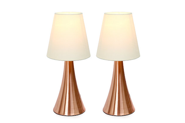 Add a contemporary feel to any room with these attractive golden rose touch lamps. Touch controls with 4 settings (Low, Medium, High, Off). The fabric shades complete this modern look. Perfect lamp for bedroom night tables. We believe that lighting is like jewelry for your home. Our products will help to enhance your room with chic sophistication.2 x mini rose gold metal touch bases | 2 x fabric shades | 4 touch settings (high, medium, low, off) | Height: 11.5" shade diameter: 4.88"