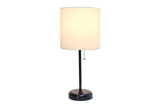 This fun and fashionable lamp features a black base and a fabric shade. It comes equipped with a 2 prong outlet seated in the base for use to charge mobile phones, handheld games, tablets, and other small electronics. This lamp will add a fabulous flair to any room. Perfect for bedrooms, kids and teens, college dorms, nurseries, or fun offices!Black base with charging outlet | Fabric shade | Perfect for bedrooms, kids room, college dorm, nursery, or fun office | Shade diameter: 8.5" x height: 19.5"