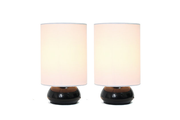 Add a contemporary feel to any room with these attractive pearl black touch lamps. Touch controls with 4 settings (Low, Medium, High, Off). The fabric shades complete this modern look. Perfect lamp for bedroom night tables. We believe that lighting is like jewelry for your home. Our products will help to enhance your room with chic sophistication.2 x fabric shades | 2 x  mini pearl black touch bases | 4 touch settings (high, medium, low, off) | Dimensions: height: 9" x shade diameter: 5"