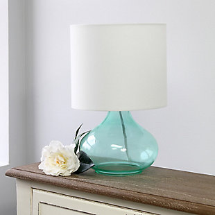 Illuminate your living space with this simple yet stylish glass table lamp.  The aqua glass raindrop shaped base and white fabric drum shade is the perfect blend  of charm to give your home a contemporary and modern upgrade.  Perfect for living rooms, bedrooms, kids and teens, college dorms, apartments, nurseries, or offices.Aqua glass base | White fabric drum shade | Easily accessible rotary switch located on the cord | Uses 1 x 40w medium type a base bulb (not included)