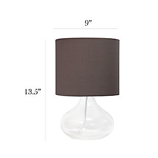 Illuminate your living space with this simple yet stylish glass table lamp.  The clear glass raindrop shaped base and gray fabric drum shade is the perfect blend  of charm to give your home a contemporary and modern upgrade.  Perfect for living rooms, bedrooms, kids and teens, college dorms, apartments, nurseries, or offices.Clear glass base | Gray fabric drum shade | Easily accessible rotary switch located on the cord | Uses 1 x 40w medium type a base bulb (not included)