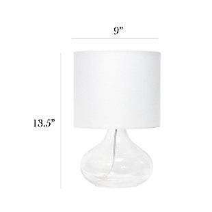 Illuminate your living space with this simple yet stylish glass table lamp.  The clear glass raindrop shaped base and white fabric drum shade is the perfect blend  of charm to give your home a contemporary and modern upgrade.  Perfect for living rooms, bedrooms, kids and teens, college dorms, apartments, nurseries, or offices.Clear glass base | White fabric drum shade | Easily accessible rotary switch located on the cord | Uses 1 x 40w medium type a base bulb (not included)