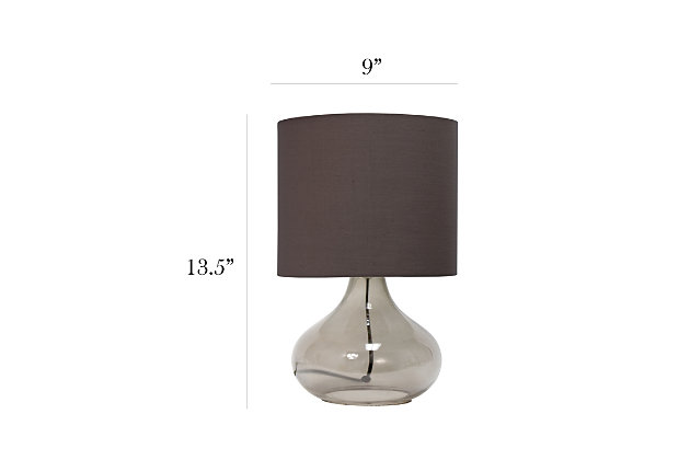 Illuminate your living space with this simple yet stylish glass table lamp.  The smoke gray glass raindrop shaped base and gray fabric drum shade is the perfect blend  of charm to give your home a contemporary and modern upgrade.  Perfect for living rooms, bedrooms, kids and teens, college dorms, apartments, nurseries, or offices.Smoke gray glass base | Gray fabric drum shade | Easily accessible rotary switch located on the cord | Uses 1 x 40w medium type a base bulb (not included)