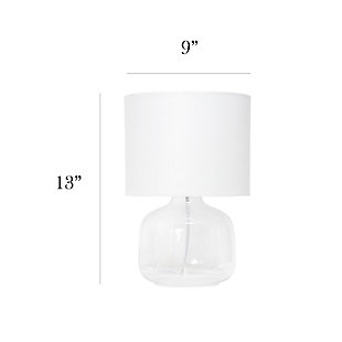Illuminate your living space with this simple yet stylish glass table lamp.  The clear glass jar shaped base and white fabric drum shade is the perfect blend  of charm to give your home a contemporary and modern upgrade.  Perfect for living rooms, bedrooms, kids and teens, college dorms, apartments, nurseries, or offices.Clear glass base | White fabric drum shade | Easily accessible rotary switch located on the cord | Uses 1 x 40w medium type a base bulb (not included)