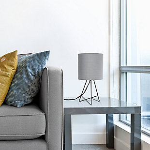 Bring function and fashion to any tabletop in your home with this modern table lamp.  The gray metal base showcases an open silhouette complimented by a gray fabric drum shade.  Perfect size for any room in your home !  Illuminate your living room, bedroom, kids and teen rooms, college dorm, apartment, nursery, or offices with this modern table lamp with contemporary flair!Gray metal base | Gray fabric drum shade | Easily accessible rotary switch located on the cord | Uses 1 x 40w medium type a base bulb (not included)