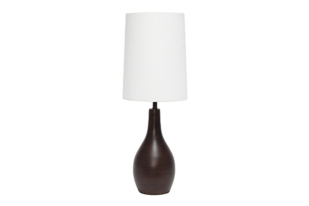 Simple yet sleek, this table lamp will add the perfect touch of style to your home.  With a smooth and traditional shaped base in Restoration Bronze, this lamp offers a polished feel to top off your accent table, night stand, living room, bedroom or office!  Paired up with a white fabric drum shade, this is the perfect fit for your home decorating needs.Flawless restoration bronze finish base | White fabric shade | Sleek and simple, adaptable to all room types | Uses 1 x 40W E26 Medium Base Type A Bulb (not included)