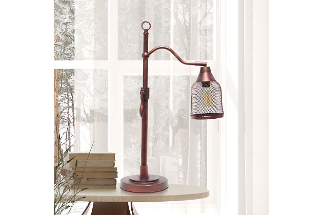 With its' street lamp styled frame, this table lamp will light up any room in your  home with vintage charm.  Featuring a metal mesh shade, red bronze finish, and the capability to adjust the height and rotate the shade, this lamp is sure to suit all of your lighting needs.  Perfect for your foyer, bedroom, library, office or living room, this industiral table lamp will add the optimal amount of lighting to your space.

**HELPFUL TIP: To get the complete vintage look, we recommend using a decorative Edison/Vintage bulb (not included). **Bell shaped metal mesh shade | Rustic red bronze finish | 1 x 60w medium type a base bulb (not included) required
*for full vintage look, type t45 edison bulb is recommended* | 6 foot black cord | Industrial style | Easily accessible on/off switch on cord