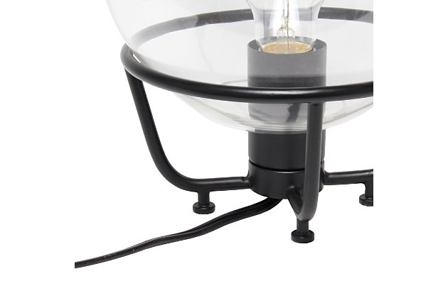 Illuminate your room in style with this modern table lamp!  The clear globe glass shade is accented by a matte black metal base for the perfect industrial look!  At 10 inches high, it's the perfect solution to freshen up your nightstand, end table or foyer.Clear globe glass shade | Black matte finish | 1 x 40w medium type a base bulb (not included) required | 5 foot black cord | Industrial style | Easily accessible on/off switch on cord