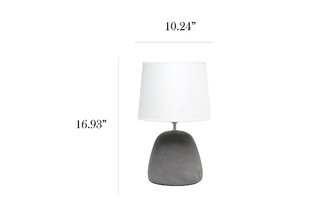 Simple yet stylish, this table lamp features a rounded gray concrete base complimented by a white fabric shade.  The perfect table lamp for an easy upgrade to give your home a sophisticated modern look!  Ideal for your living room, bedroom, office or entryway.Gray concrete base | White fabric tapered shade | Easily accessible rotary switch on cord | Uses 1 x 60w medium type a base bulb (not included) | Lamp measures l: 10.25" x w: 10.25" x h:16.50" | Sophisticated & modern