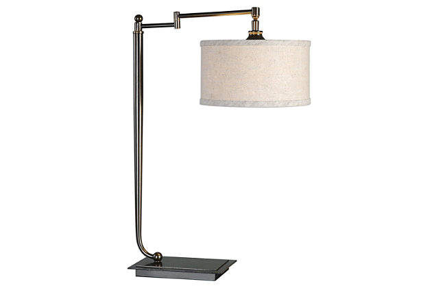 Put your contemporary decor in the best possible light with this stylish desk lamp. It features a tapered metal base finished in a plated dark bronze, and is accented by an oxidized bronze-tone foot plate with a pivoting shade arm. The suspended round drum shade is a beige linen fabric with natural slubbing. This piece illuminates your sense of style.Made of metal and fabric | Type a bulb; 100 watts max (not included) | On/off switch | Round hardback drum shade is a beige linen fabric with natural slubbing