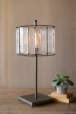 This unique industrial style lamp has a metal frame with ice-like crystal panels in each opening and will make the perfect finishing touch to your desk or nightstand.Gunmetal finish | Ul approved parts | Professional installation not required | Dust with dry cloth | Light bulb not included | Max of 40 watt bulb recommended