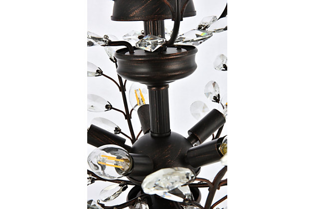 The ethereal splendor of Orchid collection chandeliers adds floral-inspired fantasy to your palace. Tiers of delicate steel branches shine in chrome, dark-bronze, or gold finishes. In lieu of flowers and buds, this fanciful seedling sprouts a wide variety of clear or golden-teak crystals. An organic centerpiece that’s breathtaking in the dining room, living room, or stairwell. Tiers of delicate-looking steel branches in a dark-bronze finish  | Highlighted with clear royal-cut crystal flowers and buds  | Lamp features a diameter of 21 inches, a height of 22 inches, and requires 8 candelabra bulbs  | comes with a 60 inch long hanging chain
