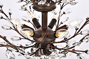 The ethereal splendor of Orchid collection chandeliers adds floral-inspired fantasy to your palace. Tiers of delicate steel branches shine in chrome, dark-bronze, or gold finishes. In lieu of flowers and buds, this fanciful seedling sprouts a wide variety of clear or golden-teak crystals. An organic centerpiece that’s breathtaking in the dining room, living room, or stairwell. Tiers of delicate-looking steel branches in a dark-bronze finish  | Highlighted with clear royal-cut crystal flowers and buds  | Lamp features a diameter of 27 inches, a height of 27 inches, and requires 13 candelabra bulbs  | comes with a 60 inch long hanging chain