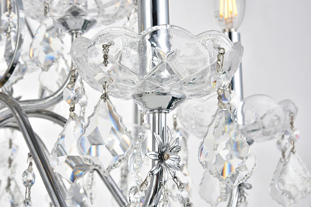 It’s easy to add a magnificent light fixture to your home with chandeliers and pendants from the St. Francis collection. Featuring intricate steel frames with graceful sweeping arms and candelabra-style bulbs (not included), these gorgeous fixtures include a dazzling visual array of delicate crystal bobéches, pendeloques, and beads. Available with a choice of beautiful metal finishes and types of crystal, in a range of diameters from 17 to 36 inches.Room use: Dining room; Living room; Bedroom; Bathroom; Entry Way; Closet | Diameter of 28 inches; minimum hanging height of 34 inches, maximum hanging height of 88 inches. | Warm, brilliant light is created by 12 light bulbs. (not included) | comes with a 60 inch long hanging chain