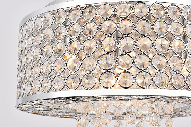 Like a brilliant shining star, the Amelie collection of hanging fixtures emits dazzling light from a bejeweled circular band, accented with gleaming strands of royal-cut crystals pouring through the open center. This chrome-finished ring surrounds four to 10 lights (not included) that highlight the intricate pattern of miniature circles that embellish the sides and bottom of the frame. In natural light, or with electricity, this sparkling hanging light would become a stunning showpiece for your space.Room use: Dining room; Living room; Bedroom; Bathroom; Entry Way; Closet | Diameter of 12 inches; minimum hanging height of 5 inches, maximum hanging height of 59.1 inches. | Warm, brilliant light is created by 4 light bulbs. (not included) | comes with an adjustable hanging cable