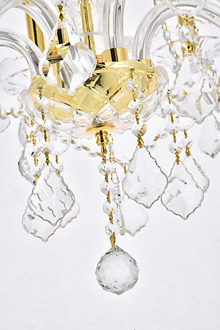 A luxurious chandelier from the Verona collection can instantly define your sophisticated style and classic taste. Six graceful arms supporting candelabra lights (not included) on crystal bobéches converge at the base of a magnificent cut-crystal center column, which is draped with strands of crystal beads. Other adornments include gorgeous crystal droplets, rings, and pendeloques. Available with a choice of finishes and types of crystal.Room use: Dining room; Living room; Bedroom; Bathroom; Entry Way; Closet | Diameter of 24 inches; minimum hanging height of 34 inches, maximum hanging height of 88 inches. | Warm, brilliant light is created by 6 light bulbs. (not included) | comes with a 60 inch long hanging chain