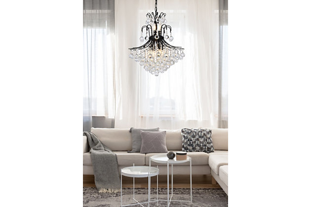 A treasure trove of glittering crystals, Toureg collection pendant lamps are generous with their sparkle. Stately curved steel arms and frame form an opulent flared shape available in black, chrome or gold finishes. Faceted clear crystal balls and crystal octagons offer a variety of options to choose from. Certain to be the center of attention in the dining room, living room, bedroom, or stairwell. Warm, brilliant light is created by 11 E12 light bulbs. (not included) | assembly is required | minimum hanging height of 32 inch and maximum hanging height of 86 inch | contrasting matte black frame finish complements the brilliant clear crystals | canopy size is 5.3 inch wide and 1.2 inch high | These exquisite gems will enrich the ambiance of any room, especially a kitchen, entryway, living room, or bathroom. | lighting is compatiable with LED bulbs and is dimmable; bulbs are not included