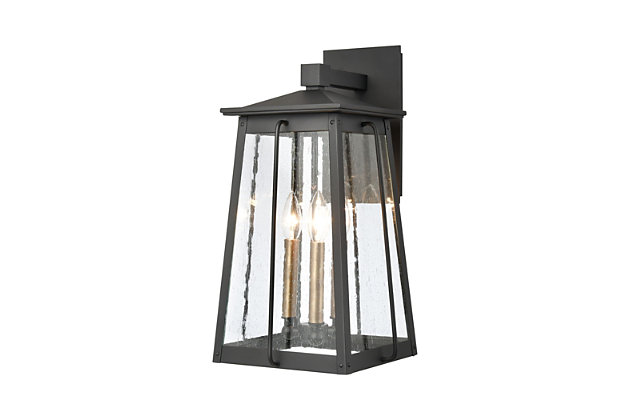 The Kirkdale 3-light outdoor sconce features solid aluminum contruction with a gently angled cage held by a die cast arm and cap.  Finished in Matte Black with Natural Brass accents and seedy glass.Rated for wet locations | 3 bulb capacity | 60 watts per bulb | Matte black & natural brass finish | Compatible with led bulb(s) | Hardwired light fixture | Cord length of 8 inches