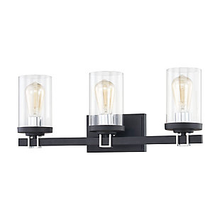 The Holdfast 3-light vanity showcases an on-trend metal buckle that becomes the focal point of connection, further highlighted by a contrasting Charcoal/Beechwood finish combination with clear glass.3 Bulb Capacity | 60 Watts per bulb | Charcoal & Beechwood Finish | Compatible with LED bulb(s) | Hardwired light fixture | Rated for a damp location | Cord Length of 8 inches