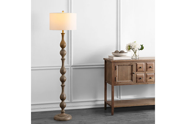 Finely crafted with gentle curves, this light brown floor lamp complements any transitional decor. From its solid base to its crisp cotton shade, its natural texture and finish radiate warmth and sophistication in any living room.Made with resin and metal; 100% cotton shade | Includes 1 led 9w bulb | Max. Wattage: 100w (type "a"), 23w (cfl), 12w (led) | On/off switch | 6' cord | Assembly required | Imported