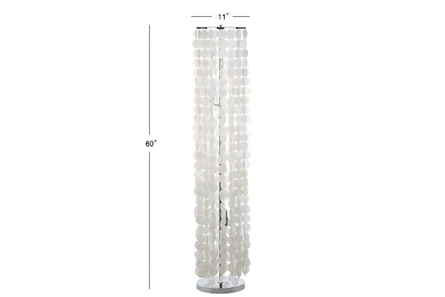 A pinnacle of serenity and style, this contemporary 60-inch floor lamp creates instant ambiance in any room. Its cascading shower of capiz shells boasts a natural organic form that imbues any room in soft light. Its metal base makes it a work of modern sculpture.Made with iron and capiz shells | Includes 3 c26 bulbs | Max. Wattage: 40w | On/off switch | 6' cord | Assembly required | Imported | Metal type: iron
