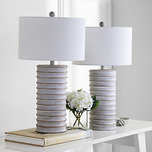 Classically elegant, this set of two table lamps makes a dramatic statement in the living room, bedroom, or entryway. Its whitewash finish adds a rustic touch to any modern decor. Set of 2 | Made with resin and metal; 100% cotton shade | Each lamp includes 1 LED 9W bulb | Max. wattage: 100W (Type "A"), 23W (CFL), 12W (LED)  | On/off switch  | 5' cord | Assembly required | Imported