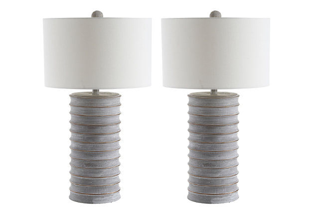 Classically elegant, this set of two table lamps makes a dramatic statement in the living room, bedroom, or entryway. Its whitewash finish adds a rustic touch to any modern decor. Set of 2 | Made with resin and metal; 100% cotton shade | Each lamp includes 1 LED 9W bulb | Max. wattage: 100W (Type "A"), 23W (CFL), 12W (LED)  | On/off switch  | 5' cord | Assembly required | Imported