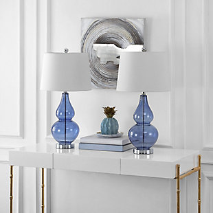 Bold and beautiful, this contemporary table lamp adds drama to any interior with a brilliant burst of color. Its sinuous glass curves are adorned with a dynamic blue hue that radiates alongside a polished chrome-tone base and complementary white shade.Set of 2 | Made with glass and iron; 100% cotton shade | Includes 2 led a19 9w bulbs | Max. Wattage: 100w (type "a"), 23w (cfl), 12w (led) | On/off switch | 5' cord | Assembly required | Imported