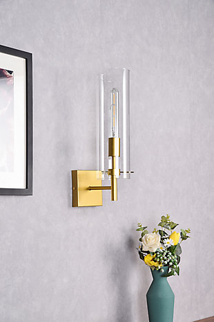 This wall sconce from the Savant Collection is a simple, but excellent, piece to have. Its cylinder shape creates an intriguing look that will fit in with your aesthetic. This light is dimmable.Made of glass and metal | Features square backplate | Clear glass cylinder  | Uses E26 bulb (sold separately) | Can be installed with the light facing up or down | Dry and damp listed | Lighting is compatible with LED bulbs | Dimmable | No assembly required | Imported