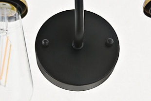 Add a graceful allure to your home with the classical elegance of the Serif Collection wall lamp in a black finish. Reminiscent of a classical font, the arm supports four lights that emit a reassuring brilliance. With a gentle presence, it's a wonderful fixture to greet your guests at the entryway, illuminate your cabinets in the living room, or shine in the powder room.Made of metal | four-light wall sconce with metal arm and circular backplate | Uses four E26 bulbs (sold separately) | Exposed bulbs (no shades) | Wall sconce extension: 6.3" | Dimmable | No assembly required | Imported