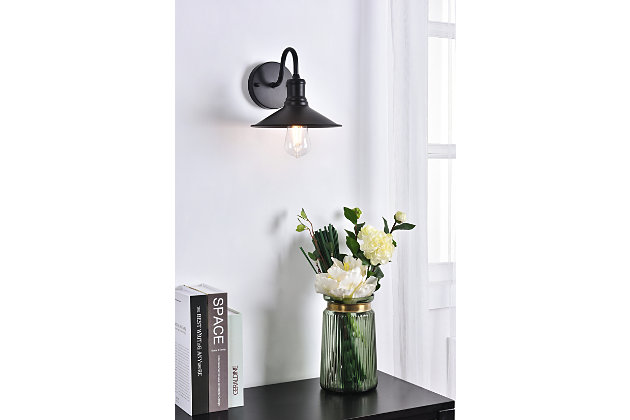 The lilting personality of the Etude wall lamp will have you singing for days. Whether the crescent arm catches your attention or its classic lampshade makes you speechless, this wall lamp will surely improve the style of any room in your home.Made of metal | Wall sconce with curved arm and circular backplate | Uses E26 bulb (sold separately) | Cone-shaped shade | Wall sconce extension: 10.2" | Dimmable | Assembly required | Imported