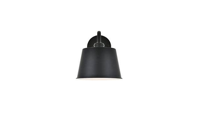 The Nota Collection wall lamp creates a melody of illumination that will shine brilliantly. Like a single whole note played with certainty and purpose, this single wall light will bring a purposeful, beautiful light to any home large or small.Made of metal | Contemporary and minimalistic wall sconce in a black finish with drum-shaped shade and gentle curving arm | Uses E26 bulb (sold separately) | Drum-shaped metal shade with white interior | Circular backplate | Wall sconce extension: 10.8" | Dimmable | Assembly required | Imported