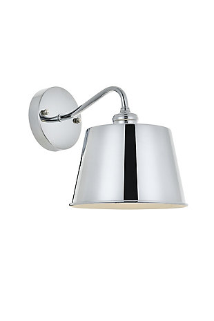 The Nota Collection wall lamp creates a melody of illumination that will shine brilliantly. Like a single whole note played with certainty and purpose, this single wall light will bring a purposeful, beautiful light to any home large or small.Metal with chrome finish | Contemporary and minimalistic wall sconce in chrome finish with drum-shaped shade and gentle curving arm | Uses E26 bulb (sold separately) | Drum-shaped metal shade with white interior | Circular backplate | Wall sconce extension: 10.8" | Dimmable | Assembly required | Imported