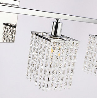 This Phineas Collection wall sconce exudes elegance and sparkling beauty. Why wouldn't it, with its beautiful curtain of clear crystal strands that shimmer with each passing second as light passes through? Your home will be illuminated and your guests will be charmed by the dancing crystal lights. You will be pleased with how this wall lamp can elevate any room into a luxurious and glamourous world.Made of crystal glass and iron | Glamourous and ritzy wall sconce will sparkle with cool ease | Curtains of clear crystals | 4 lights illuminate downward  | Uses E12 bulb (sold separately); compatible with LED bulbs | Easily mounted on wall | Dimmable | Assembly required | Imported
