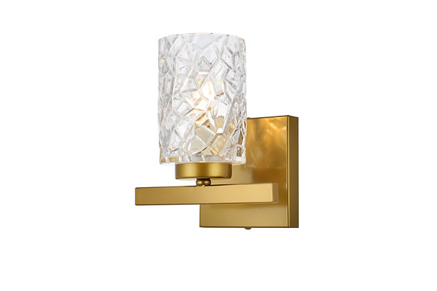In all of its auspicious glory, the Cassie Collection wall sconce will shine its felicitous light for you. As the light passes through the shade, it dances around with the shadows and puts a spotlight in your room. Whether it's in your entryway or bathroom, this wall lamp will surely please you and your guests. Made of glass and metal | Ideal for lighting the bathroom, hallway, and entryway | Easily mounted on the wall | Dimmable | Uses E12 bulb (sold separately) | No assembly required | Imported | No assembly required