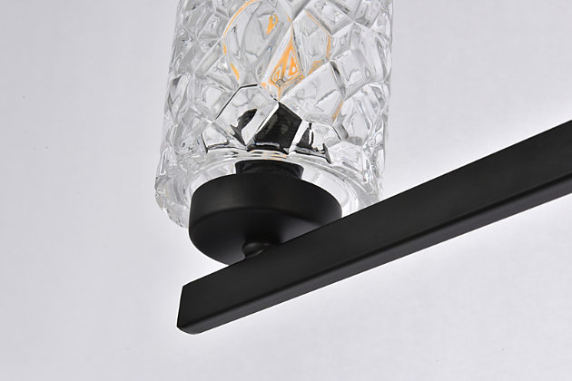 In all of its auspicious glory, the Cassie Collection wall sconce will shine its felicitous light for you. As the light passes through the shade, it dances around with the shadows and puts a spotlight in your room. Whether it's in your entryway or bathroom, this wall lamp will surely please you and your guests. Made of glass and metal | Ideal for lighting the bathroom, hallway, and entryway | Easily mounted on the wall | Dimmable | Uses three E12 bulbs (sold separately) | No assembly required | Imported