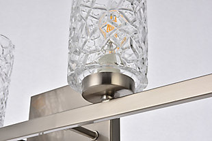 In all of its auspicious glory, the Cassie Collection wall sconce will shine its felicitous light for you. As the light passes through the shade, it dances around with the shadows and puts a spotlight in your room. Whether it's in your entryway or bathroom, this wall lamp will surely please you and your guests. Glass and metal with silvertone finish | Ideal for lighting the bathroom, hallway, and entryway | Easily mounted on the wall | Dimmable | Uses four E12 bulbs (sold separately) | No assembly required | Imported