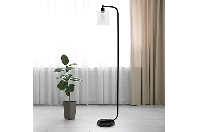 The sophistication of industrial accents gleams in this beautifully crafted iron floor lamp. The humble design combines a simple base with curved arm and a clear glass shade for the perfect ensemble. Add to any room for a modest and refined look. HELPFUL TIP: To get the complete industrial look, we recommend using a decorative Edison/Vintage bulb (not included).Black finish | Clear cylindrical glass shade | Uses (1) 60w medium base bulb (not included); for full vintage look, type t45 edison bulb is recommended | Footswitch on cord | Clean and modern look