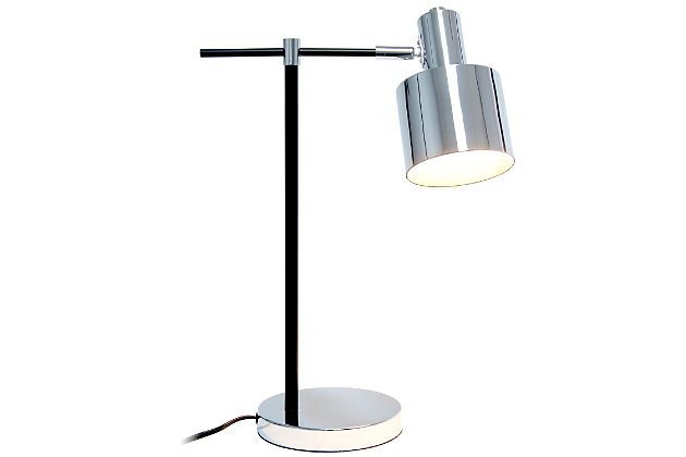 Illuminate your living space with this simple yet bold table lamp. It features a beautiful polished chrome finish with black accents. The perfect accent piece for your office, bedroom, foyer or living room.Polished chrome finish | Round metal shade | Modern and industrial | (1) 40w type a base bulb (not included) required | Easily accessible on/off switch on cord | 5 foot black cord
