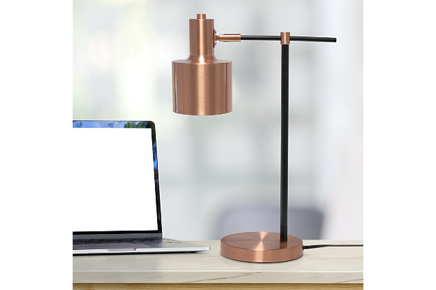 Illuminate your living space with this simple yet bold table lamp. It features a beautiful polished rose gold finish with black accents. The perfect accent piece for your office, bedroom, foyer or living room.Polished rose gold finish | Round metal shade | Modern and industrial | (1) 40w type a medium base bulb (not included) required | Easily accessible on/off switch on cord | 5 foot black cord