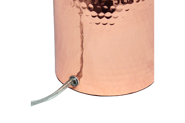 This fun and fashionable lamp features a rose gold hammered metal base and a white fabric shade. It comes equipped with a USB seated in the base for charging mobile phones, handheld games, tablets, and other small electronics. This lamp will add a fabulous flair to any room. Perfect for bedrooms, kids and teens, college dorms, nurseries, or fun offices.Rose gold base with usb charging port on base | White fabric shade | Perfect for bedrooms, kids room, college dorm, nursery, or fun office | Uses (1) 40w type a medium base bulb (not included) | Usb port on base for charging your phone or other device | Base includes storage for supplies