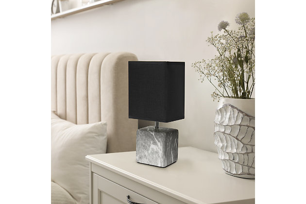Sleek and sophisticated, this chic table lamp is perfect for adding a little style to any room. Crafted from ceramic, this design features an elegant marble-like construction in its bold square base. Perfect for bedrooms, entryways, kids and teens, college dorms, nurseries, or offices.Black faux marble base | Black rectangular fabric shade | Trendy faux marble look | Uses (1) 40w type b e-12 candelabra base bulb (not included) | Easily accessible rotary switch located on the cord | Lamp is a mini lamp; please see details for height