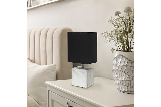 Sleek and sophisticated, this chic table lamp is perfect for adding a little style to any room. Crafted from ceramic, this design features an elegant marble-like construction in its bold square base. Perfect for bedrooms, entryways, kids and teens, college dorms, nurseries, or offices.White faux marble base | Black rectangular fabric shade | Trendy faux marble look | Uses (1) 40w type b e-12 candelabra base bulb (not included) | Easily accessible rotary switch located on the cord | Lamp is a mini lamp; please see details for height