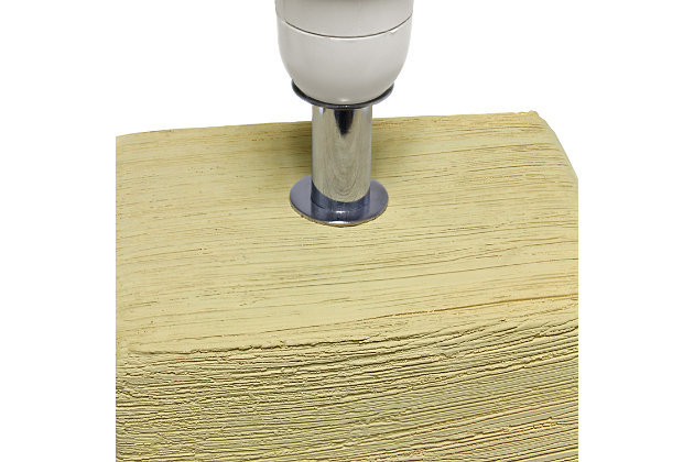 Clean and modern, this simple table lamp features a square faux stone base crafted from ceramic. The crisp, soft fabric shade adds a gentle touch to the textured base. Perfect for bedrooms, entryways, kids and teens, college dorms, nurseries, or offices.Beige faux stone base | White rectangular fabric shade | Trendy faux stone look | Uses (1) 40w type b e-12 candelabra base bulb (not included) | Easily accessible rotary switch located on the cord | Lamp is a mini lamp; please see details for height