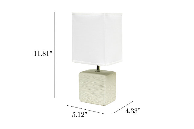 Clean and modern, this simple table lamp features a square faux stone base crafted from ceramic. The crisp, soft fabric shade adds a gentle touch to the textured base. Perfect for bedrooms, entryways, kids and teens, college dorms, nurseries, or offices.Off-white faux stone base | White rectangular fabric shade | Trendy faux stone look | Uses (1) 40w type b e-12 candelabra base bulb (not included) | Easily accessible rotary switch located on the cord | Lamp is a mini lamp; please see details for height
