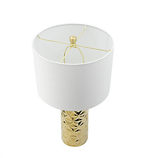 The diamond press pattern of this cylinder table lamp enhances the elegance of its goldtone ceramic base and gives it a distinctly contemporary feel. To offset the engaging complexity of this pattern, the base is paired with a simple white hardback drum shade that’s clean and understated. It’s designed with the modern sofa in mind.Made of ceramic and metal with harback fabric shade | Diamond press pattern cylinder with goldtone finish | Base with goldtone finish | Rotary switch | 1 type A bulb (not included); 100 watts max; UL Listed | Indoor use only | Imported | Assembly required