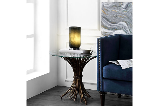 Designed to be an art piece whether turned on or off, this table lamp is a mesmerizing focal point in any decor. The gray textured glass gives a captivating shine, while its chrome pedestal base balances the look for today’s contemporary chic homes. Add this light to an accent table to create a soothing, relaxing ambiance among your decorMade of metal with glass cylinder shade | Gray textured glass | Base with polished chrome-tone finish | On/off switch | Uses single 4-watt led bulb (included) | 60" power cord; ul listed | Indoor use only | Assembly required | Imported